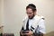 Orthodox cleans the place of tefillin after prayers