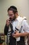 Orthodox cleans the place of tefillin after prayers