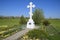 Orthodox cross on the entrance to the settlement. Symbol of the Christian faith. Orthodox cross for absorption entering into the c