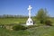 Orthodox cross on the entrance to the settlement. Symbol of the Christian faith. Orthodox cross for absorption entering into the c