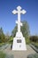Orthodox cross on the entrance to the settlement. Symbol of the Christian faith. Orthodox cross for absorption entering into the c