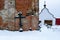 Orthodox cross, shot from the dome of the dilapidated chapel in the men`s monastery, Russia, winter.