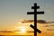 Orthodox cross on in the sunbeams of the sunset. Faith and faith concept. Spiritual moment