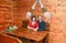 Orthodox family, the couple sitting at the wooden table under the icon