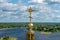 Orthodox golden cross on the dome of the Epiphany Cathedral