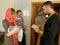 Orthodox infant baptism ceremony at home in Belarus.