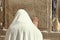 Orthodox Jewish Man prays at the western wall