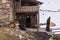 Orthodox priest in front of ushguli chapel