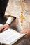 Orthodox priest with an open bible