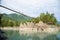 Orthodox wooden Church on Patmos island, suspension bridge over Katun river.