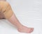 Orthopedic kneecap to relieve the load and fix the sore knee, close-up, copy space, medical, bandage