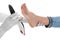 Orthopedist fitting insole on patient`s foot against background, closeup