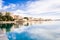 Ortigia, Syracuse, Italy / December 2018: Coast of Ortigia island at city of Syracuse. Long exposure sea. Reflection in water.