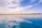 Ortigia, Syracuse, Italy / December 2018: Sailboats and yachts docked at the marina. Turquoise sea water, sunny sky, romantic