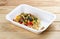 Ortolana pasta with vegetable sautÃ©. Healthy food. Takeaway food. On a wooden background