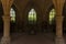 Orval Abbey, in Belgium. Ruins of the Cistercian monastery and the Gothic church. Indoors room with arches and vaults.