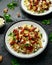 Orzo Pasta with sunshine dry tomato, black olives, walnut and feta cheese