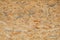 OSB pressed sawdust board,wood chips,wooden texture beckground,seamless surface