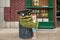 Oscar the Grouch with little girl in Sesame Street Party Parade at Seaworld.