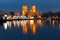 Oslo City Hall in the night with the reflection in the glossy water