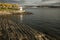 Oslo - the fjord and its dark waters, sunlit shore.