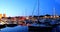 Oslo, Norway - June 24, 2019: Night View Embankment, Oslo City Hall And Moored Yachts Near Aker Brygge District. Summer