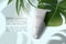 osmetics advertising, skincare concept. leaves or flowers.tube of cream on light background 3d illustration with plants