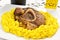 Osso buco bivine meat with rice with saffron