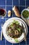 Ossobuco alla Milanese dressed with gremolata.