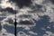 Ostankino TV tower silhouette in Moscow against dark cloudy sky