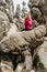 Ostas Nature Reserve and table mountain,Broumov region,Czech republic.Sitting girl enjoying view of rocks,caves,bizarre sandstone