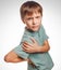 Osteochondrosis kid teenage boy isolatd holds his