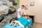 Osteopath therapist, makes the manipulation and massage the patient with an injury.