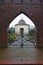 Osterholz-Scharmbeck, Germany - December 3rd, 2017 - View through the churchyard gate towards the funeral chapel