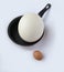 Ostrich egg on frying pan