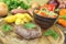 Ostrich steak with crispy baked potatoes and vegetables