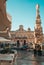 Ostuni\\\'s Historic Center Beautiful Piazza with Parasols and Stunning City Hall View Against Clear Blue Sky