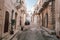 Ostuni\\\'s Narrow Alleys Typical Lane with Balconies Against White Walls