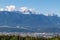 Oswaldiberg - A panoramic view on the city of Villach embedded in the Austrian Alps. The mountains in the back are very steep