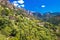 Ota town with the mountains in the background near Evisa and Porto, Corsica, France.