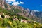 Ota town with the mountains in the background near Evisa and Porto, Corsica, France.