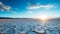 An otherworldly scene of salt flats and salt pans stretches to the horizon, reflecting the sky like a mirror