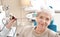 Otolaryngologist examining senior woman\\\'s ear with ENT telescope in hospital