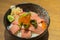 Otoro sashimi (raw tuna with fat) and salmon eggs on top of Japanese rice
