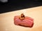 Otoro sushi topped bluefin tuna belly with Sea urchin uni, caviar and gold flake
