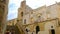 Otranto, Italy kids sit stairs old town outside Otranto basil