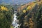 Ottauquechee River cuts through Quechee Gorge in autumn.