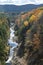 Ottauquechee River cuts through Quechee Gorge in autumn.