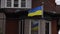 Ottawa, Canada - November 6, 2022: Consular Section of the Embassy of Ukraine with Ukrainian flag.