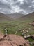 Oukaimeden, shepherds\\\' huts among mountains and green plains in autumn, Morocco